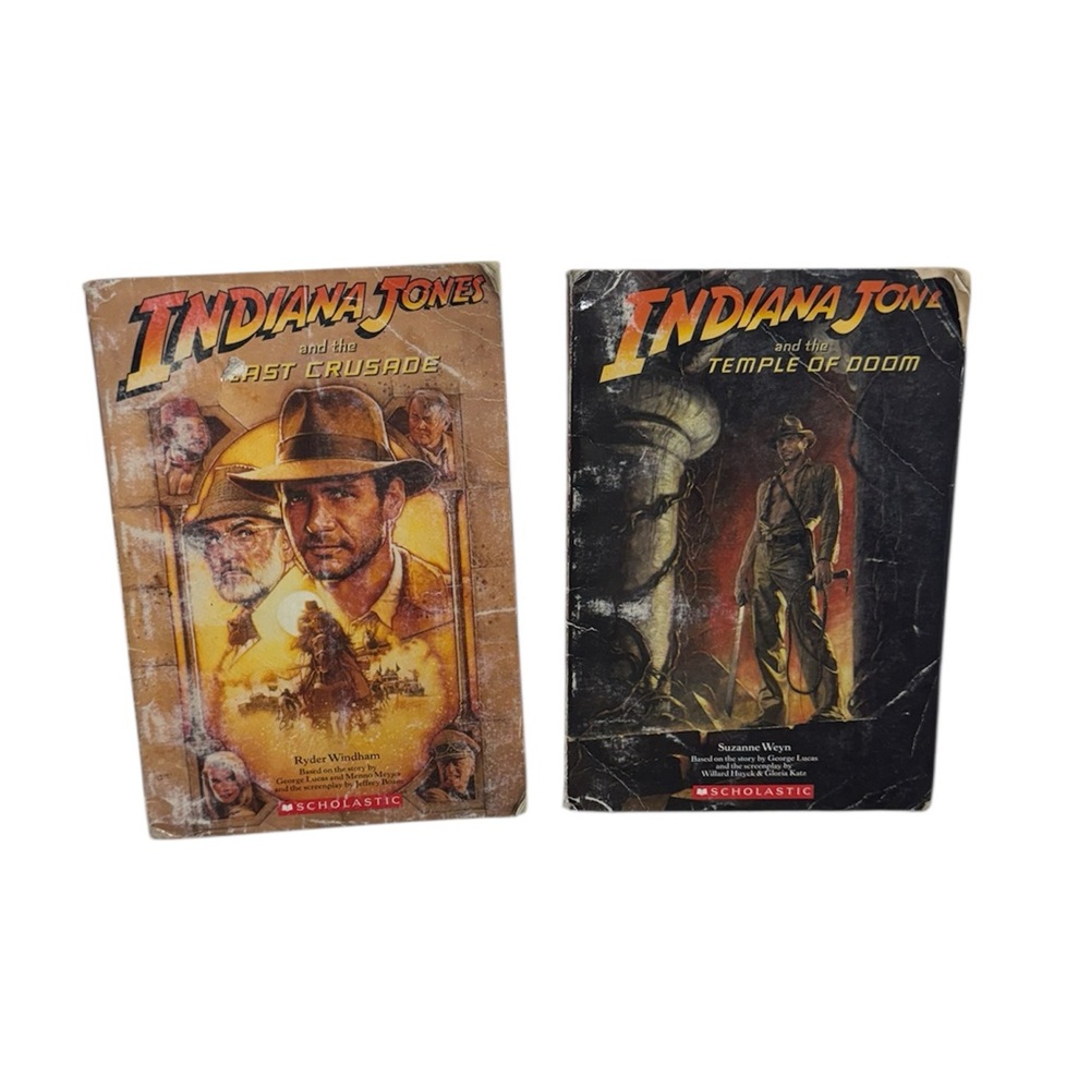 2 Indiana Jones scholastic paper back books with colored picture pages inside!